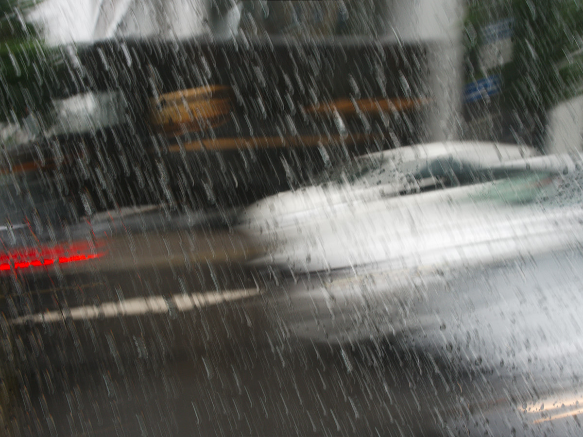 Driving in the Rain. Tagged with Urban, rain, traiffic